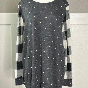 Polka dot and plaid top.